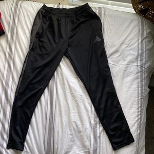 black and grey adidas track pants/sweats/joggers